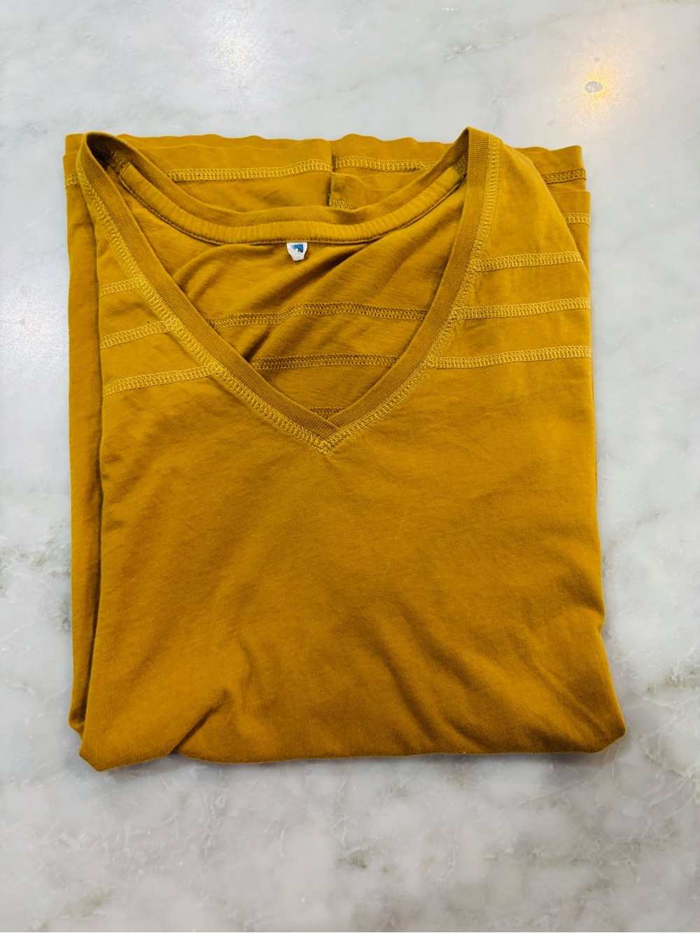 Kuhl Women's Short Sleeve V-Neck Tee in Mustard